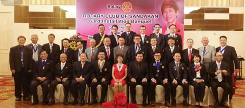 DC Viola Tsen in a group photo with members of the Rotary Club of Sandakan, as their guest of honour at their Installation Banquet